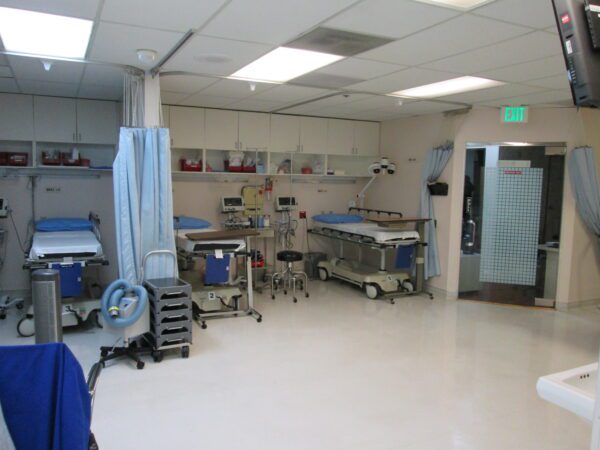 A Hospital Unit With Three Beds and Control Devices