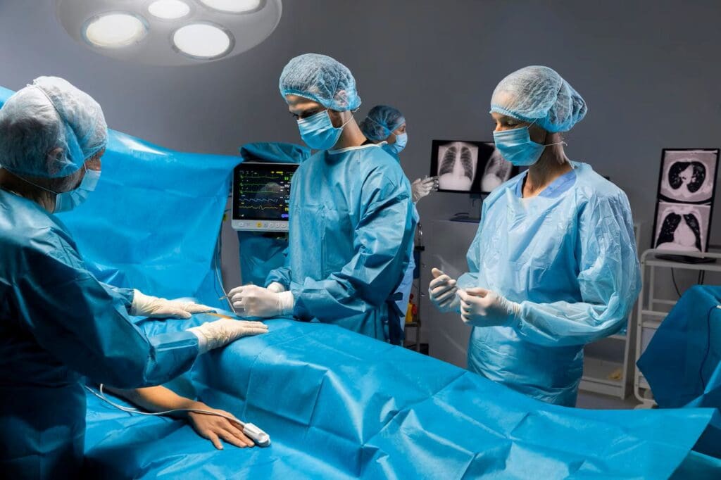 Surgeons performing an operation in a sterile operating room.